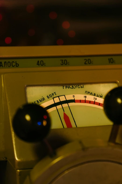 a close up of a radio on a table, by Sven Erixson, moscow metro, taken in night club, panorama, charts