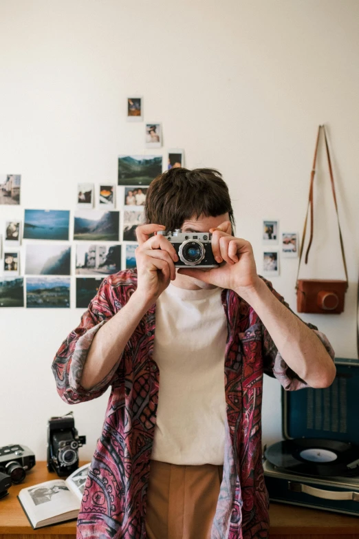 a man taking a picture of himself with a camera, unsplash contest winner, visual art, declan mckenna, home album pocket camera photo, halfbody headshot, half - length photo