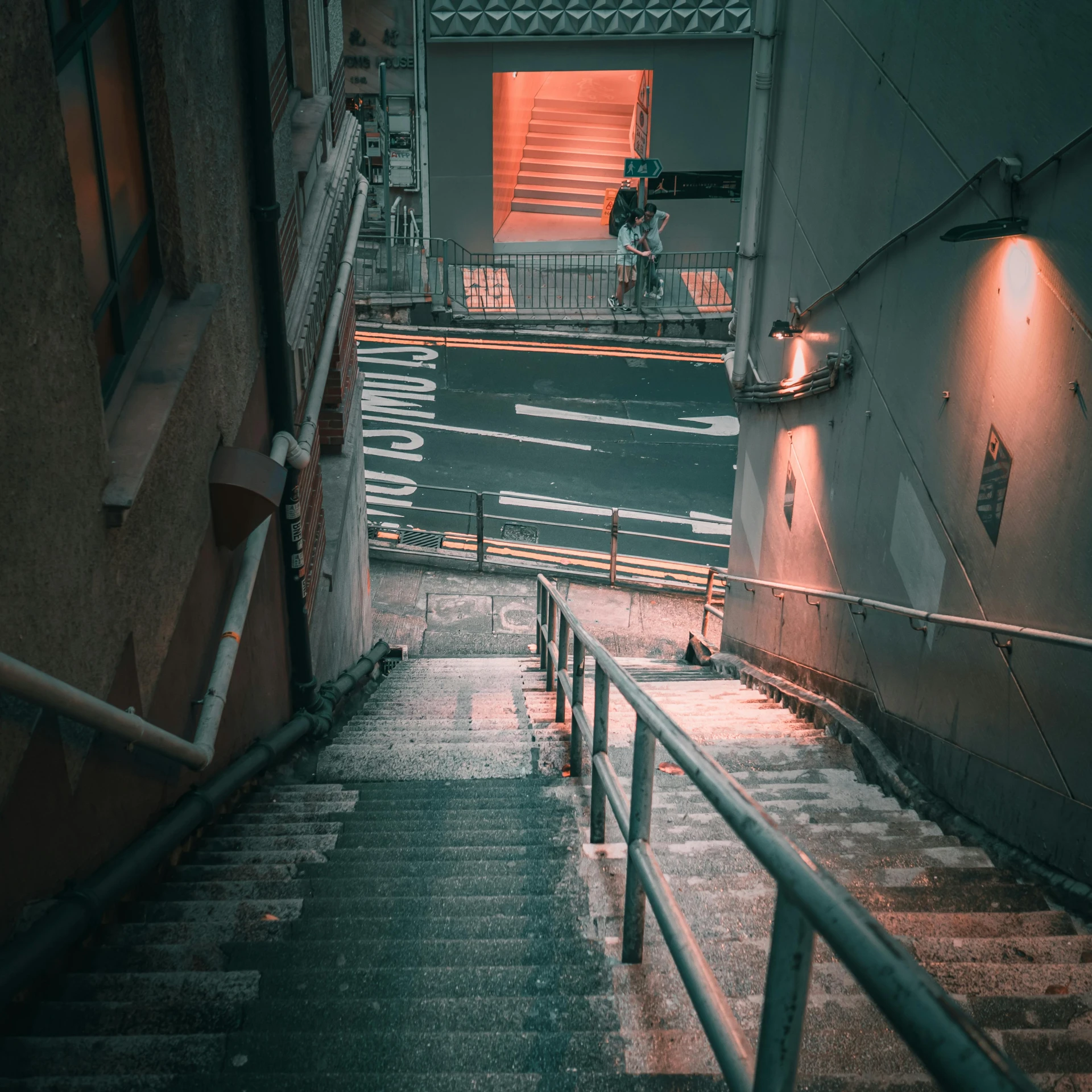 a person riding a bike down a set of stairs, a picture, inspired by Elsa Bleda, unsplash contest winner, mingei, cyberpunk streets in japan, nightlife, small steps leading down, distant photo