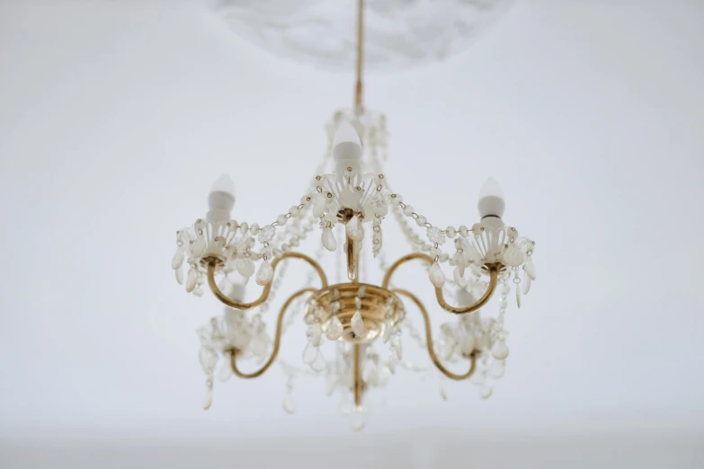 a crystal chandelier hanging from a ceiling, by Cerith Wyn Evans, unsplash, rococo, detailed model, 1950’s, mint, lot of details