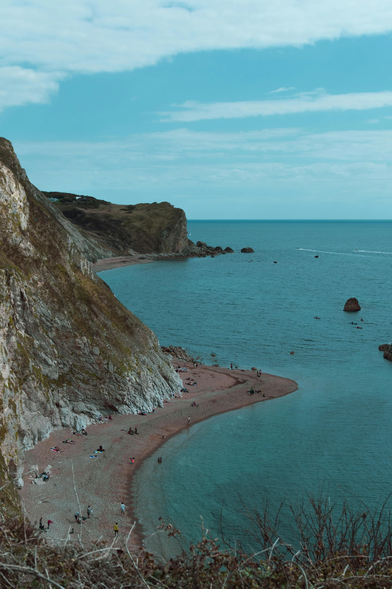 a large body of water next to a cliff, by Rachel Reckitt, pexels contest winner, renaissance, kodachrome colour, the wicker man, today\'s featured photograph 4k, square