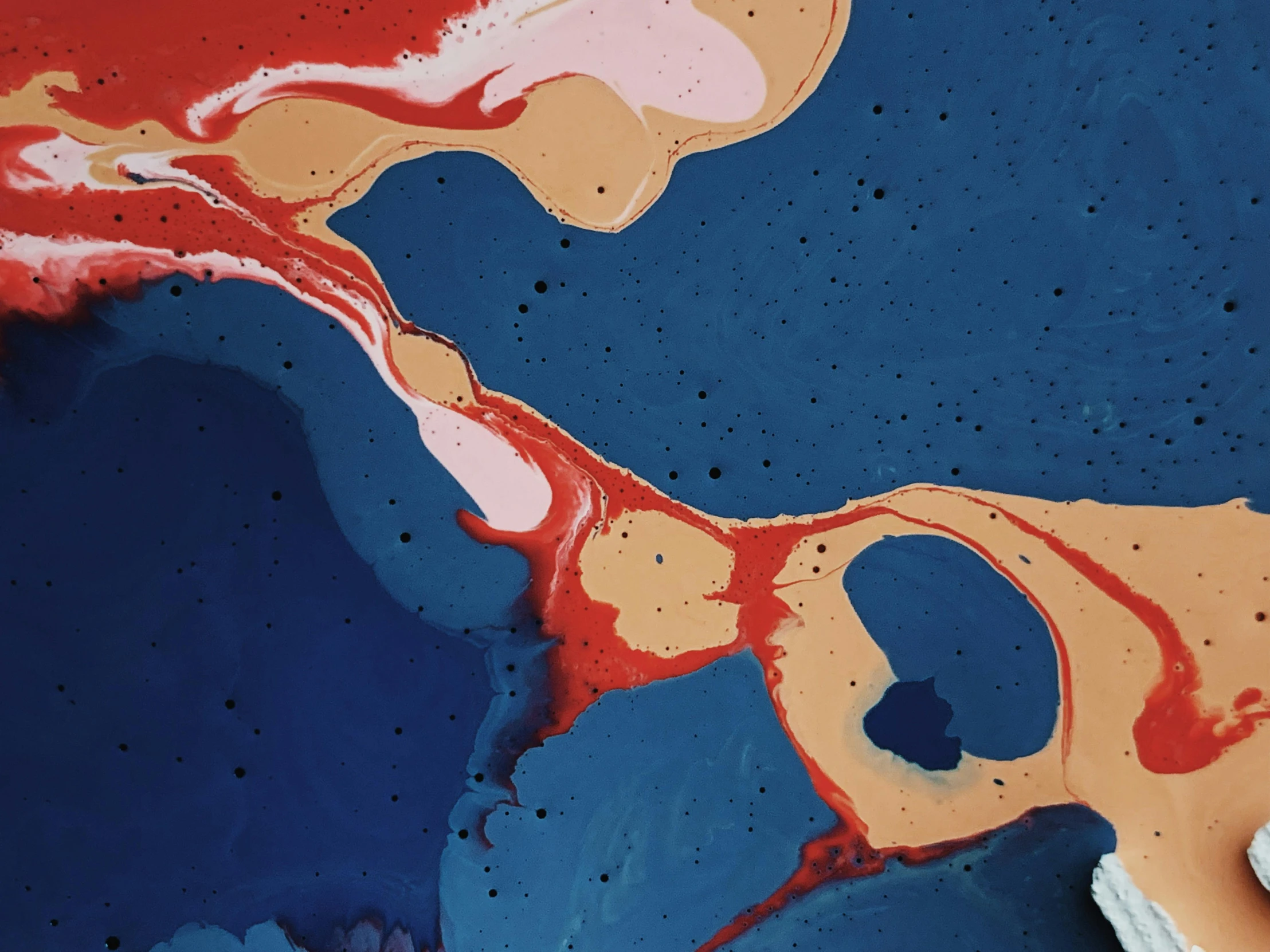 a doughnut with a bite taken out of it, inspired by Shōzō Shimamoto, trending on unsplash, abstract expressionism, dark blue and red, 144x144 canvas, seen from space, coastline