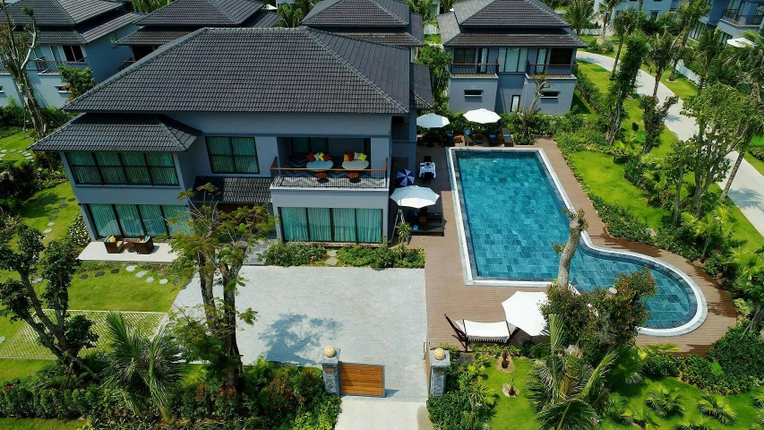 an aerial view of a house with a swimming pool, pexels contest winner, thai, grey, luxurious environment, units