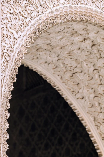 a clock mounted to the side of a building, a detailed painting, inspired by Frederick Lord Leighton, arabesque, white sweeping arches, intricate mycelial lace, detail shot, ivory carved mantle