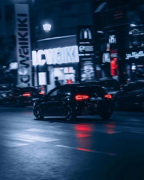 a car driving down a city street at night, by Adam Marczyński, pexels contest winner, all black cyberpunk clothes, 🚿🗝📝