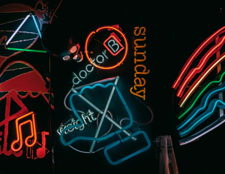 a group of neon signs hanging from the side of a building, an album cover, pexels, music notes, booze, abstract neon shapes, sunday afternoon