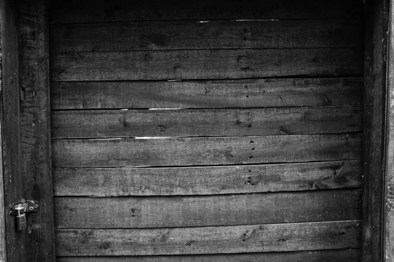 a black and white photo of a wooden door, by Karl Buesgen, ( ( abstract ) ), pallet, wooden banks, 64x64