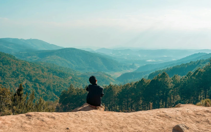a person sitting on top of a mountain, pexels contest winner, korean countryside, afternoon hangout, youtube thumbnail, slightly pixelated