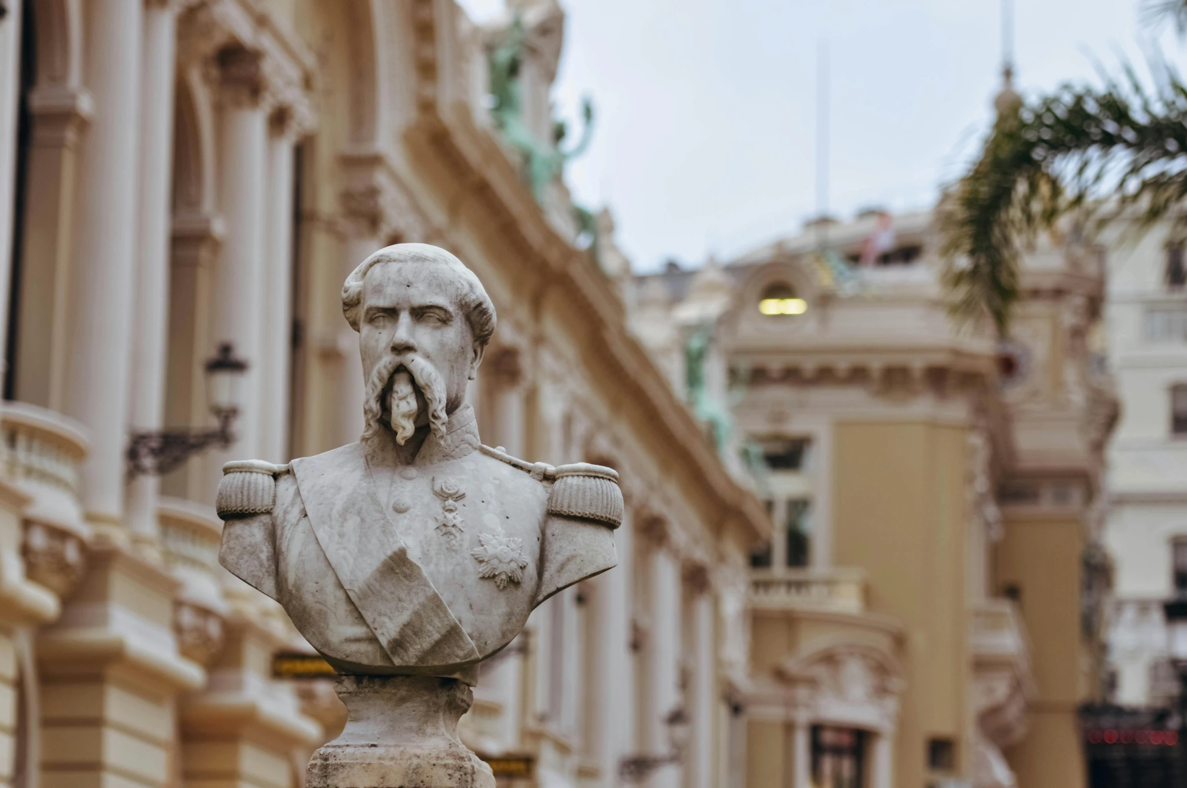 a bust of a man in front of a building, a statue, inspired by Vincenzo Cabianca, pexels contest winner, square, monaco, a salt&pepper goatee, rococo decorations