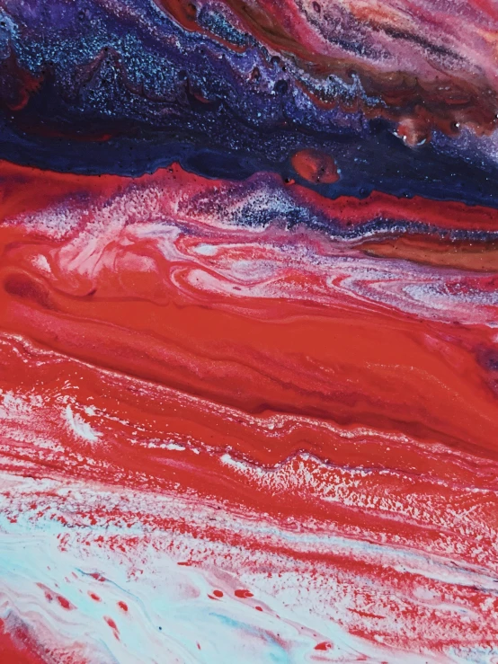 a close up of a red and blue painting, trending on unsplash, abstract art, sand swirling, similar to the bifrost, ilustration, jelly - like texture. photograph