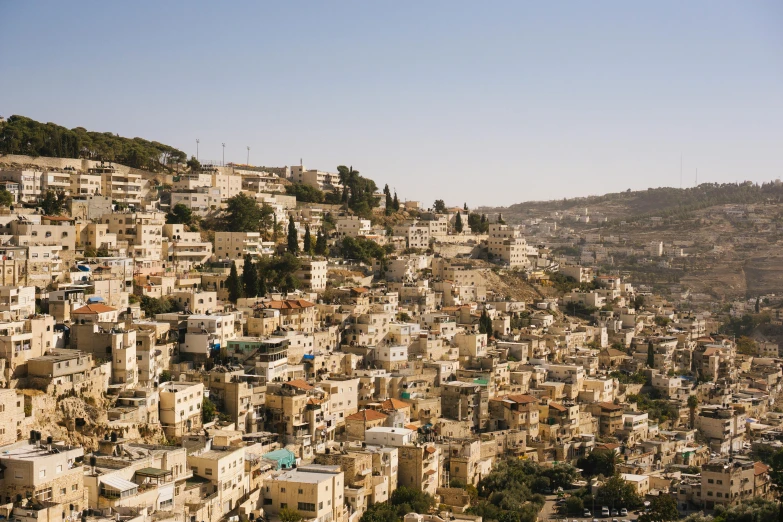 a view of a city from the top of a hill, trending on unsplash, les nabis, sukkot, 2 0 0 0's photo, aida muluneh, preserved historical