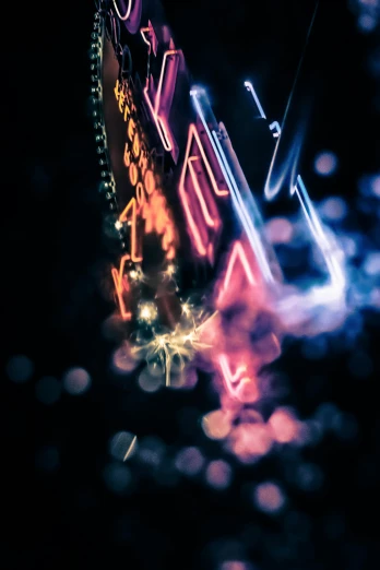 a neon sign hanging from the side of a building, a hologram, inspired by Bruce Munro, unsplash, fractal flame. highly_detailded, macro bokeh ”, firework, shattered abstractions