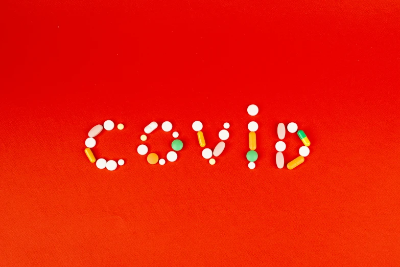 the word drugs spelled out of pills on a red background, by Olivia Peguero, pexels, poster of corona virus, coward, a cold, cover corp