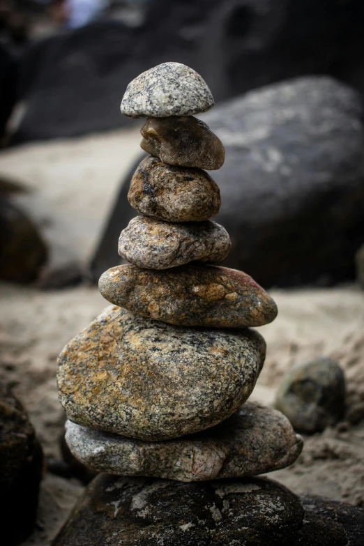 a pile of rocks stacked on top of each other, by Slava Raškaj, paul barson, aruba, mixed art, f / 2 0