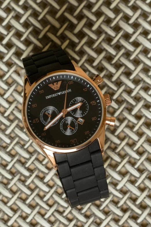 a close up of a watch on a table, by Kev Walker, unsplash, armani, rose gold, gold and black color scheme, thumbnail