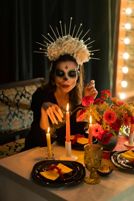 a woman sitting at a table with a candle, dia de los muertos, bone crown, fine dining, square