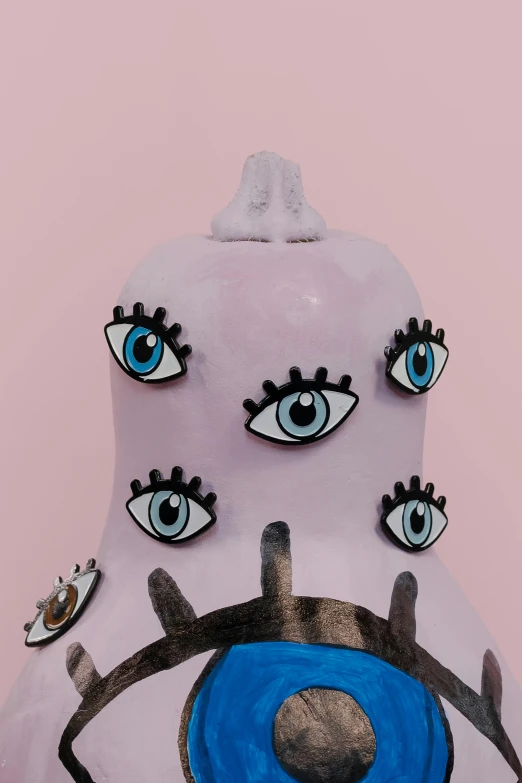 a close up of a gourd with eyes painted on it, a surrealist sculpture, pop surrealism, humanoid pink female squid girl, on a pale background, cone heads, see