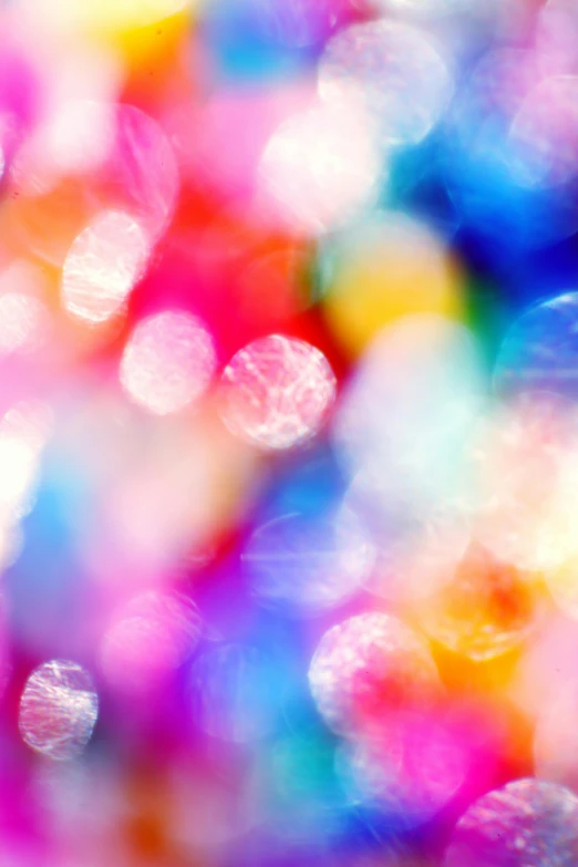 a blurry photo of a bunch of bubbles, inspired by Alfred Manessier, pointillism, iridescent accents. vibrant, candy - coated, brightly-lit, 1 0 2 4 farben abstract