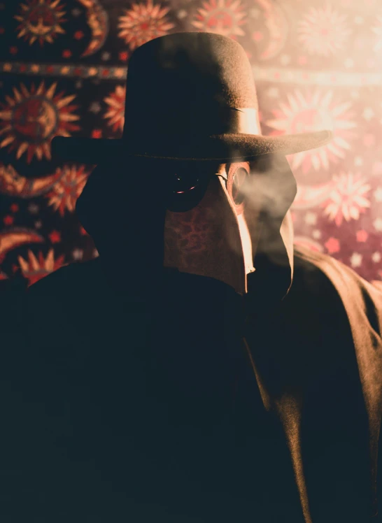 a man in a hat smoking a cigarette, an album cover, pexels contest winner, lurking in the shadows, masked, ( ( theatrical ) ), profile image