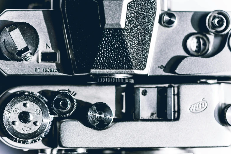 a black and white photo of a camera, a black and white photo, by Adam Marczyński, unsplash, visual art, highly mechanical, color graflex macro photograph, vintage aesthetic, medium format