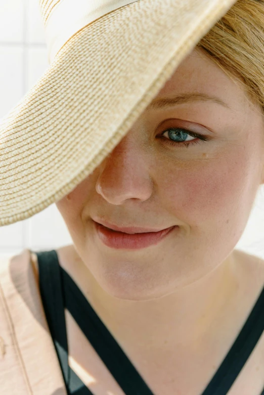 a close up of a person wearing a hat, full sun, kirsi salonen, multiple stories, adele