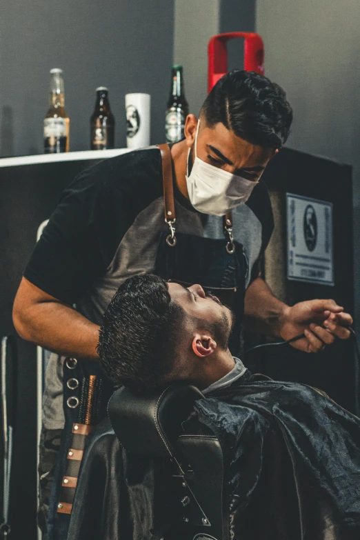 a man getting a haircut at a barber shop, pexels contest winner, wearing a mask, ash thorp khyzyl saleem, thumbnail, square masculine jaw