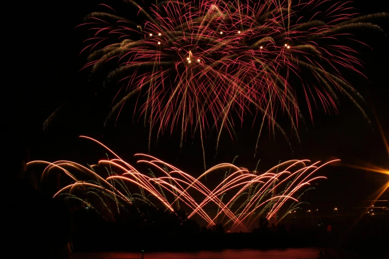 a bunch of fireworks that are in the sky, pexels contest winner, hurufiyya, energy flows of water and fire, reds, 15081959 21121991 01012000 4k, portrait shot