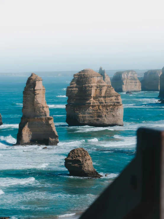 the twelve apostless, great ocean road, great ocean road, great ocean road, great ocean road, great ocean road, great ocean road, pexels contest winner, banner, high quality image”, black domes and spires, high view