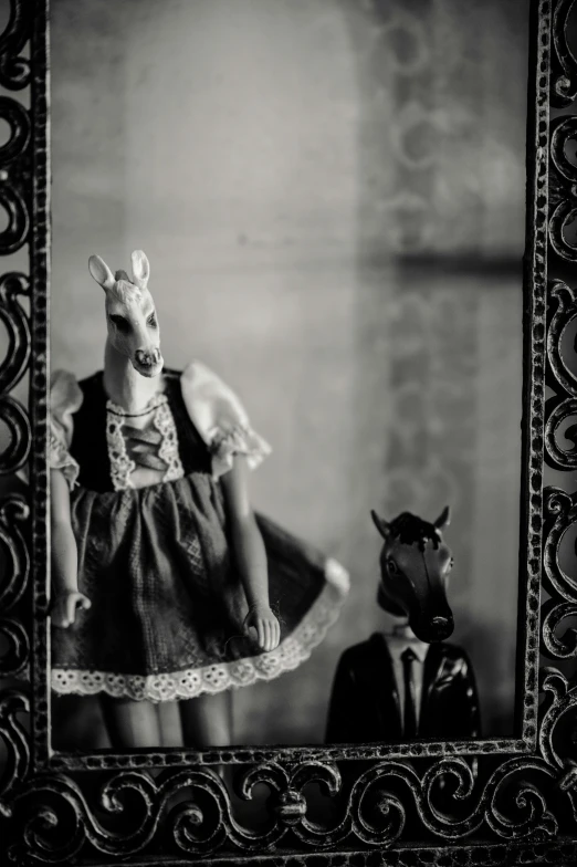 a black and white photo of a doll in a frame, inspired by Diane Arbus, unsplash, renaissance, obama riding an unicorn, groom, ffffound, american gothic style