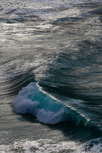 a man riding a wave on top of a surfboard, by Daniel Seghers, pexels contest winner, renaissance, pristine rippling oceanic waves, manly, viewed from bellow, glistening seafoam