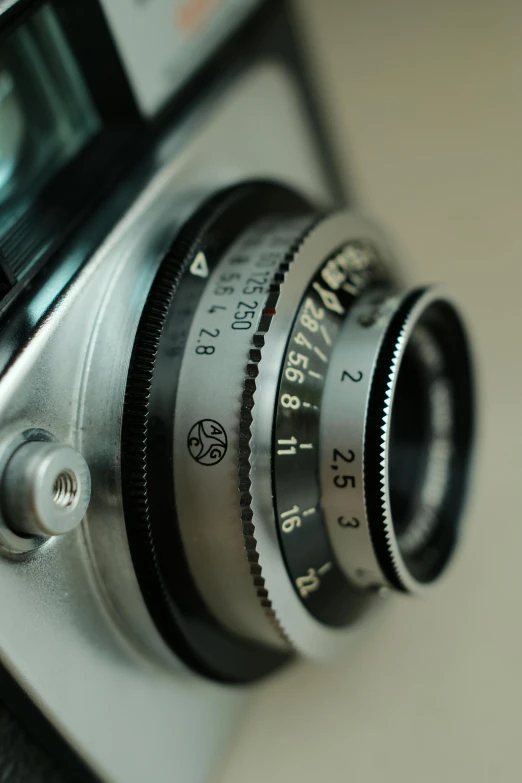 a close up of a camera with a lens, a macro photograph, by Sven Erixson, unsplash, rolleiflex tlr, aperture f/9, f2.8 50mm, medium format