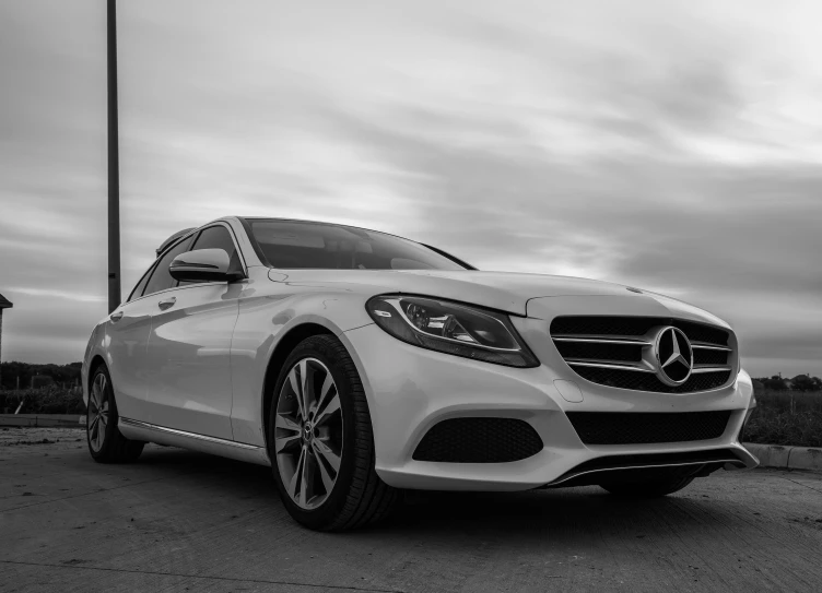 a black and white photo of a mercedes, pexels contest winner, glossy white metal, miranda meeks, full colour, high quality upload