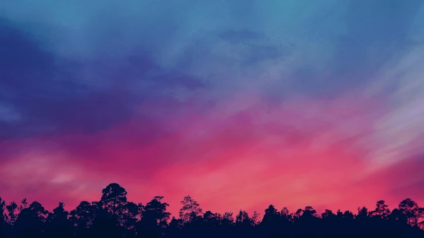 a pink and blue sky with trees in the background, an album cover, inspired by Elsa Bleda, pexels contest winner, forest colors, blood red sky, desktop wallpaper