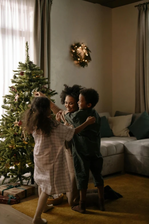 a couple of kids standing in front of a christmas tree, dancing with each other, placed in a living room, essence, fan favorite