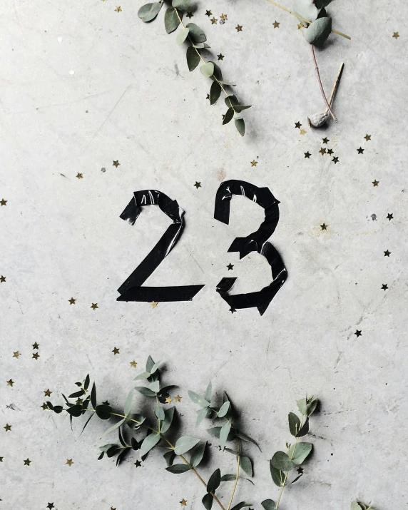 a close up of a clock with numbers on it, an album cover, by Julia Pishtar, unsplash, ffffound, made of concrete, year 2 3 0 0, with black vines