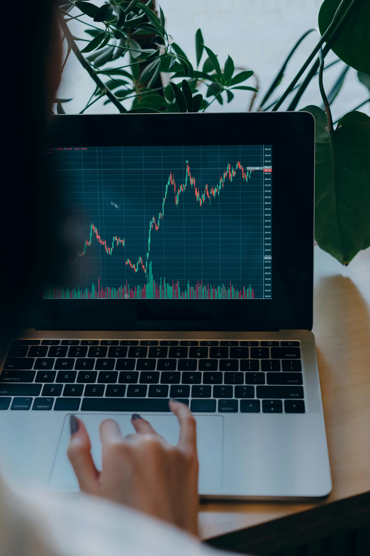 a person sitting in front of a laptop computer, trending on unsplash, analytical art, displaying stock charts, square, high quality photo, mythological