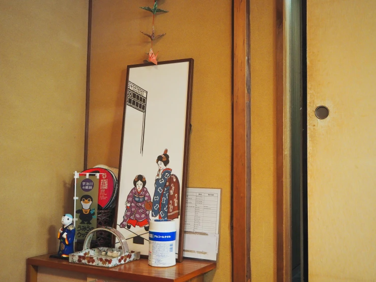 a mirror sitting on top of a wooden table, a picture, ukiyo-e, various items, illustration »