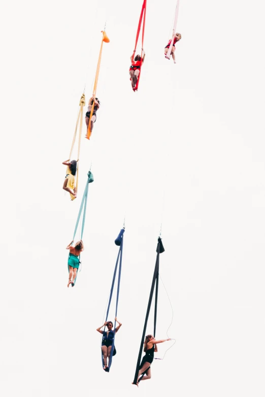 a group of people that are flying in the air, by Ren Hang, unsplash, cords, circus, high angle vertical, 15081959 21121991 01012000 4k