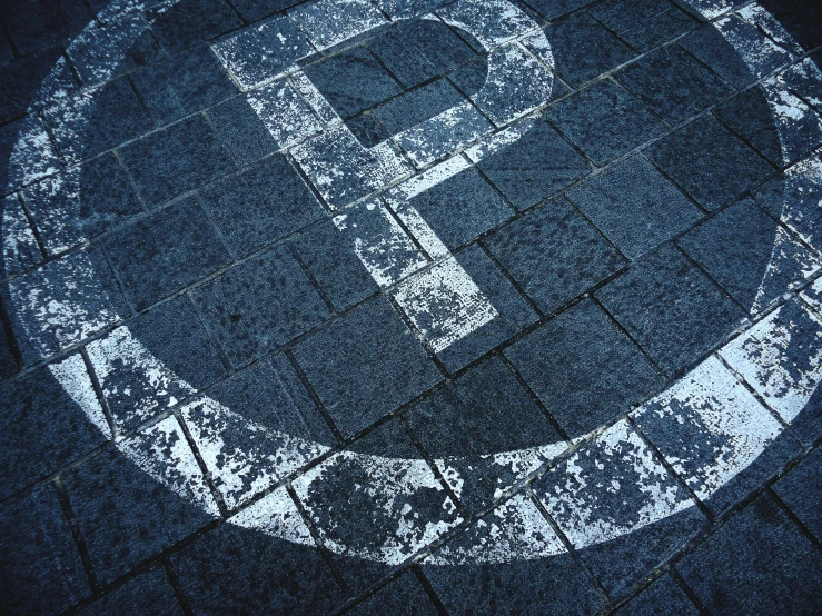 a parking sign sitting on the side of a road, by Giovanni Pelliccioli, pixabay, graffiti, circle pit, floor tiles, silver, profile image