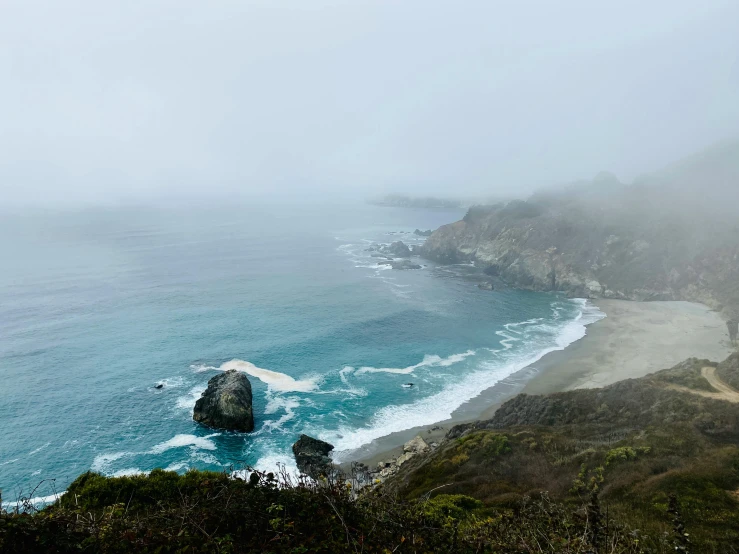 a view of the ocean on a foggy day, a photo, pexels contest winner, pch, 2 5 6 x 2 5 6 pixels, cyan mist, high angle shot