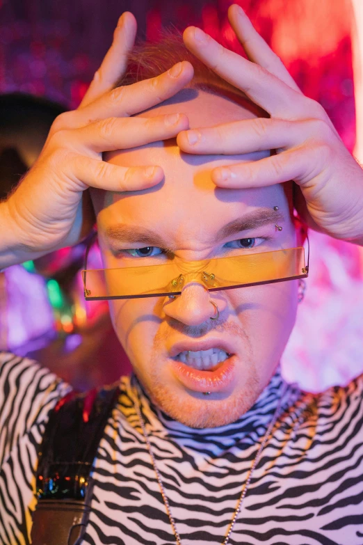 a man with a pair of glasses on his head, an album cover, pexels, maximalism, frustrated face, heath clifford, at a rave, balding