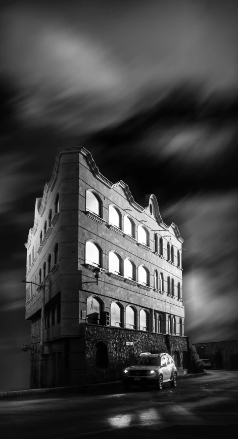 a black and white photo of a building, a black and white photo, inspired by Franz Sedlacek, nightime long exposure, surrealism - n 9, square, old buildings