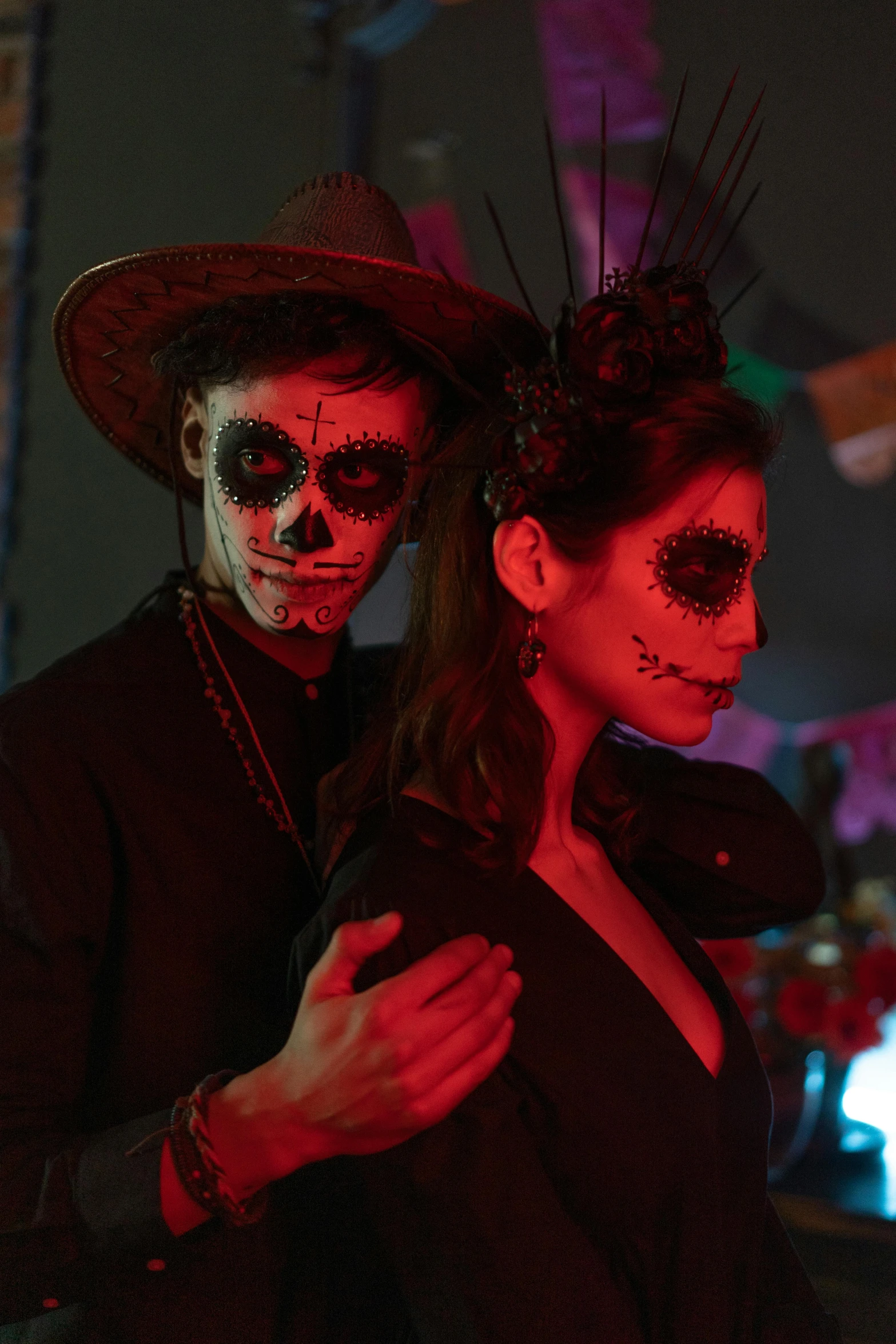 a man and woman in day of the dead costumes, pexels, serial art, spooky netflix still shot, nightlife, square, behind the scenes