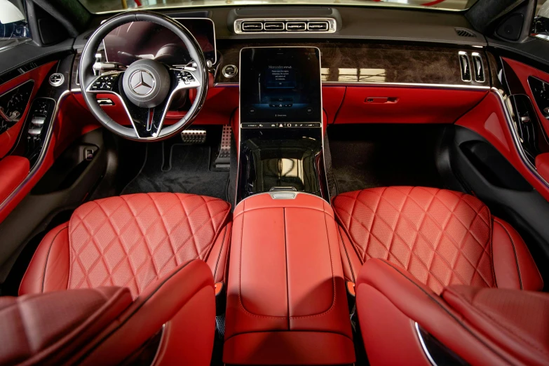 the interior of a car with red leather seats, mercedes, square, shot with sony alpha 1 camera, brown