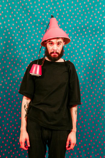 a man wearing a pink hat and holding a drink, an album cover, resembling a mix of grimes, circle beard, bao pham, lights off
