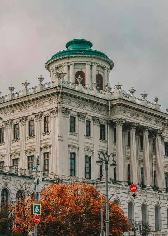 a large white building with a green dome on top, inspired by Mihály Munkácsy, pexels contest winner, neoclassicism, during autumn, square, high quality screenshot, peredvishniki