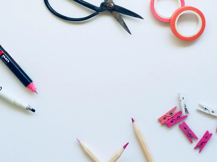 a pair of scissors sitting on top of a white table, a child's drawing, various items, background image, whiteboards, taken from the high street