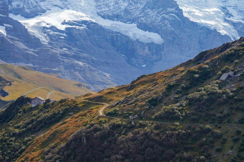 a view of the mountains from the top of a mountain, by Daniel Seghers, pexels contest winner, les nabis, switzerland, natural stone road, conde nast traveler photo, fall season