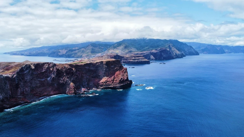 a large body of water next to a cliff, by Daniel Lieske, pexels contest winner, renaissance, azores, avatar image, aerial view of an ancient land, islands on horizon