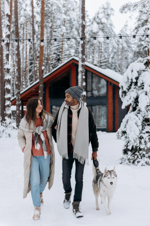 a man and woman walking a dog in the snow, pexels contest winner, luxurious wooden cottage, 🚿🗝📝, nordic forest colors, thumbnail